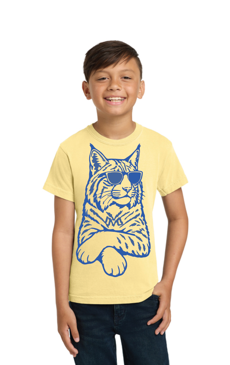 Youth model wearing a light yellow Cool Cat T-shirt with a blue cat graphic wearing sunglasses